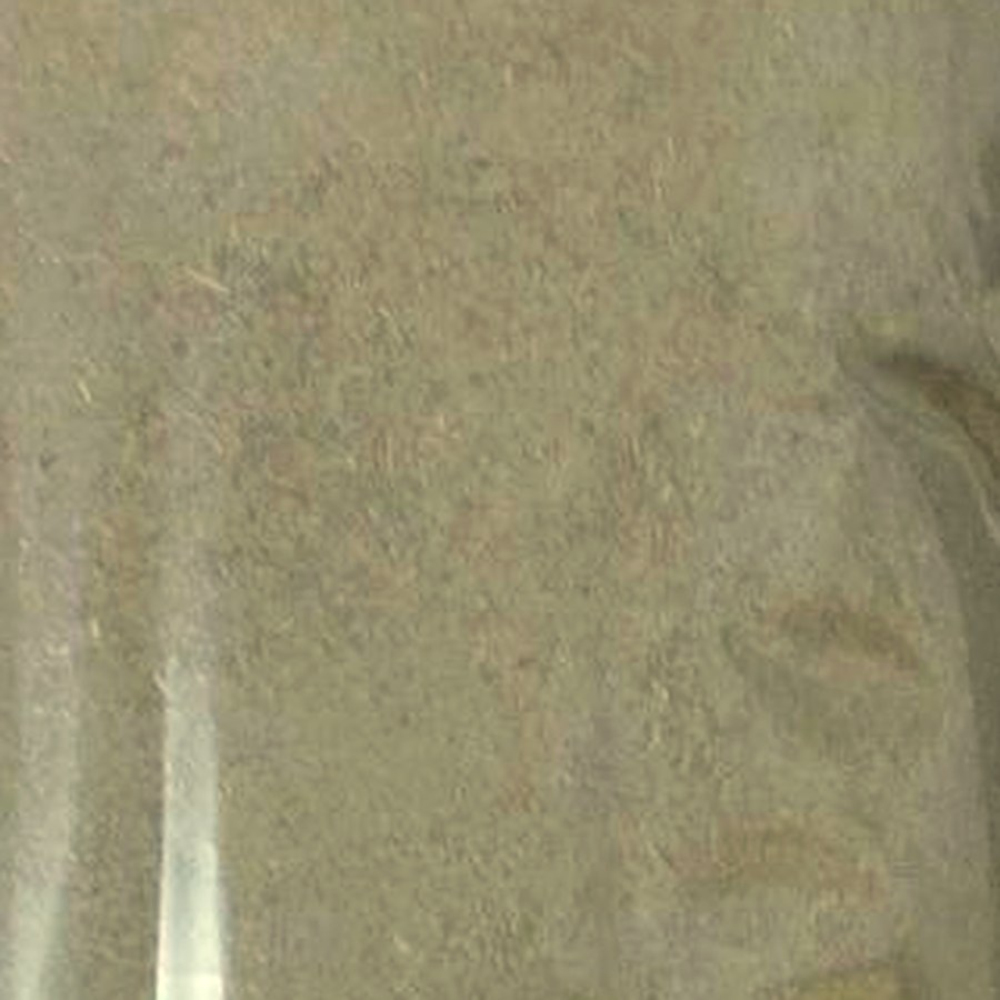 Fine milled kava powder close-up, warm tan tones with subtle texture